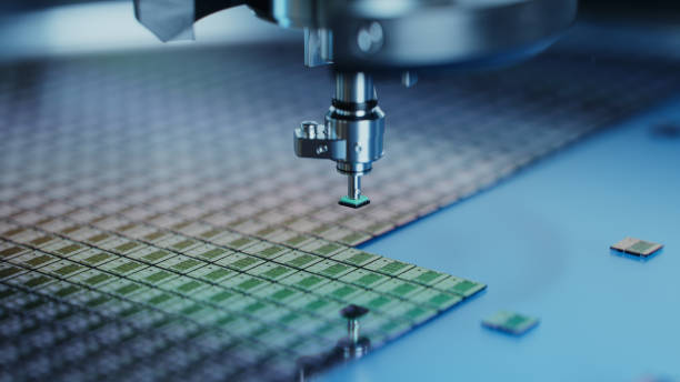 istock Close-up of Semiconductor Packaging Process. Computer Chips are being Extracted by a Pick and Place Machine from Wafer and Attached to Substrate. Computer Chip Manufacturing at Factory 1468266120