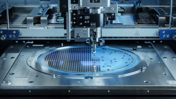 istock Semiconductor Wafer after Dicing Process. Silicon Dies are Being Extracted by Pick and Place Machine. Computer Chip Manufacturing, Packaging Process. 1468266179