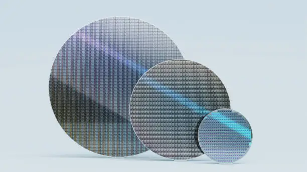 Photo of Set of Three Silicon Wafers of Different Sizes for Semiconductor Production, 300mm, 200mm and 100mm, on White Background