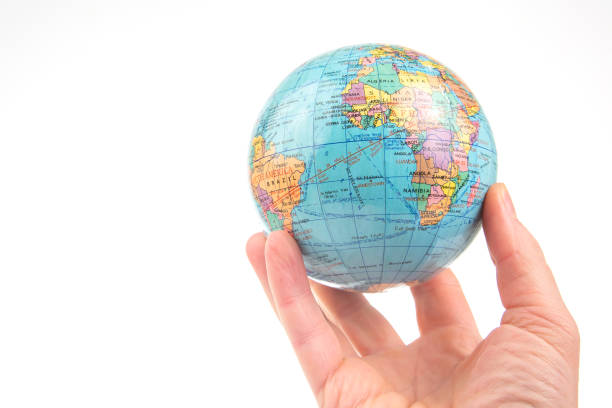 istock earth world globe in hand on white background 1468268318