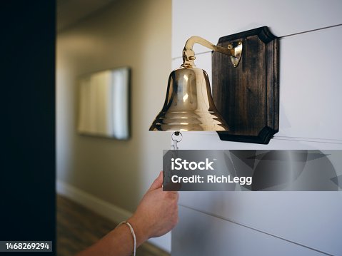 istock Large Brass Bell on a Wall 1468269294