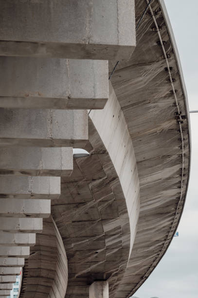 istock Partial view of a large concrete bridge against a gray sky 1468272428