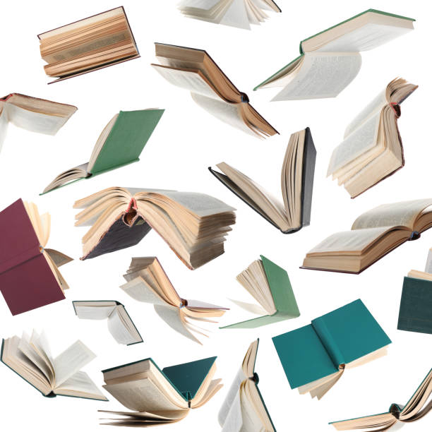 istock Many hardcover books falling on white background 1468273135