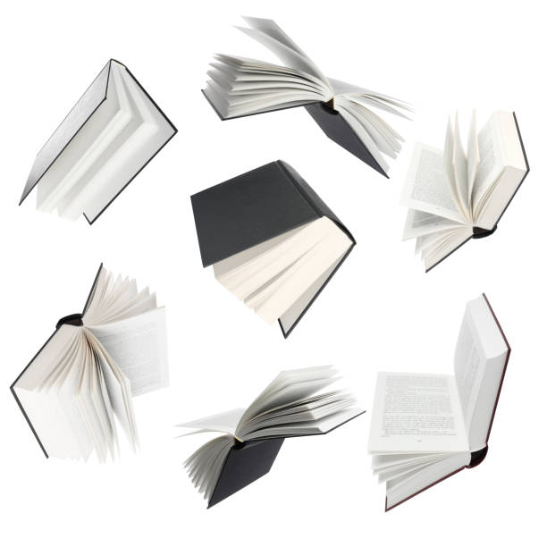 istock Many hardcover books falling on white background 1468273170