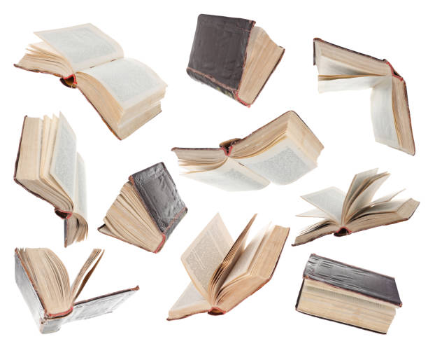 istock Many hardcover books falling on white background 1468273240