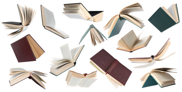 istock Many hardcover books falling on white background 1468273261