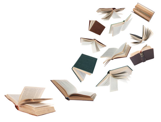 istock Many hardcover books flying on white background 1468273262