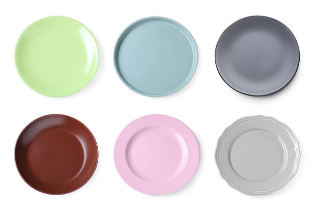 istock Set of different ceramic plates on white background, top view 1468273522