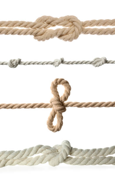 istock Set of different ropes with knots on white background, closeup 1468273631