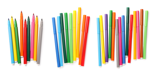 Set of many bright colorful markers on white background, top view