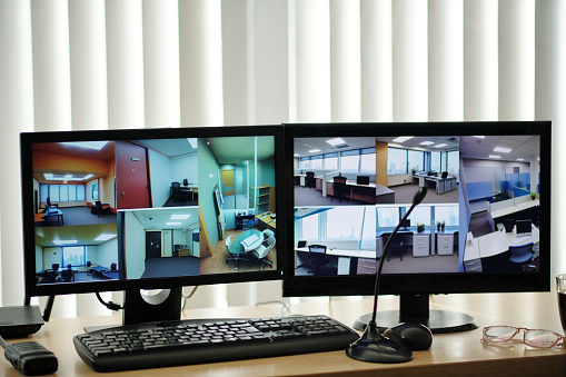 Computer monitors with footage from surveillance cameras