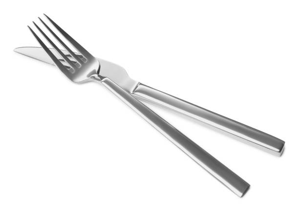 istock New shiny knife and fork isolated on white 1468277079