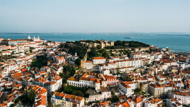 Aerial drone view in Lisbon, Portugal with surrounding cityscape stock photo