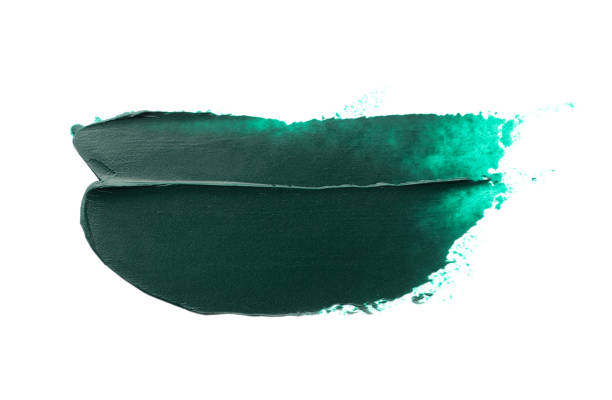 istock Dark green oil paint stroke on white background, top view 1468277430