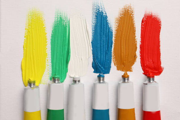 istock Tubes with oil paints and strokes on white canvas, flat lay 1468277531