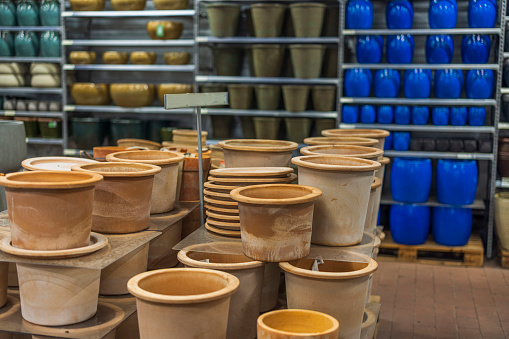View of big ceramic pots for outdoor plants. Gardening concept. Sweden.