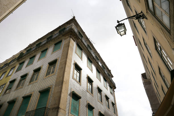 istock Typical vintage portuguese facade with white windows 1468281688