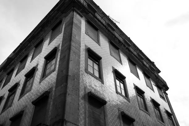 istock Typical vintage portuguese facade with white windows 1468282242
