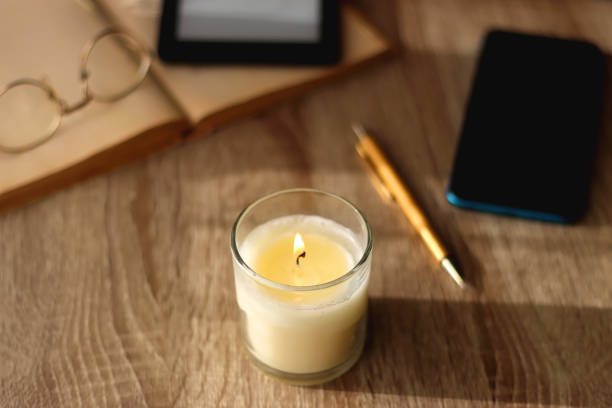 istock Books, Tablet, Glasses, Phone, Laptop and Candle 1468283900