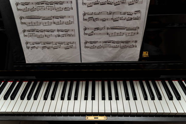 istock Keyboard and a professional piano and a musical score. 1468284483