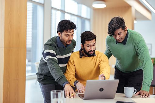 Coworkers working on project - stock photo