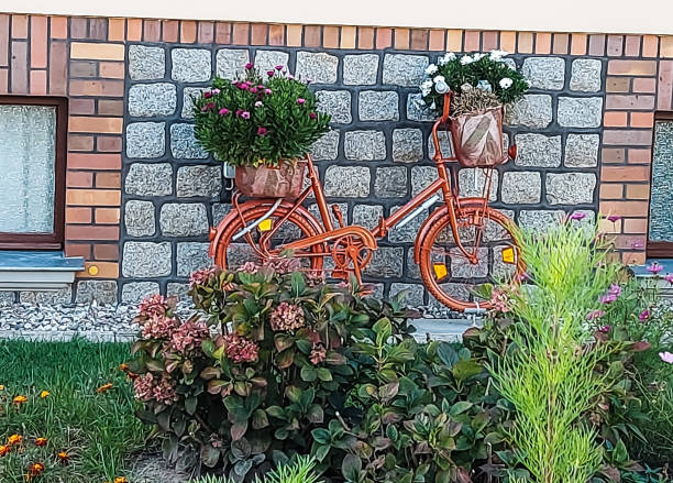 istock An old bicycle stands for decoration on a house wall 1468285391