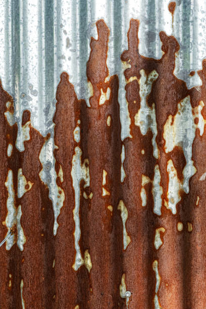 Old rusting corrugated metal wall Close up of an Old rusting corrugated metal wall corrugated metal fence ideas stock pictures, royalty-free photos & images