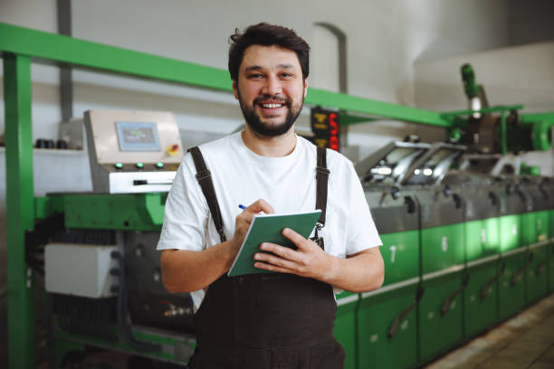 istock Man working at olives factory 1468291535