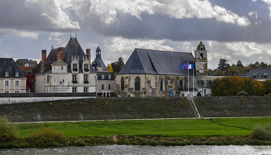Amboise, France, October 26, 2020: View of the Saint-Florentin Church (Église Saint-Florentin) on the bank of the Loire River in Amboise. The Loire Valley is listed as UNESCO World Heritage Site.