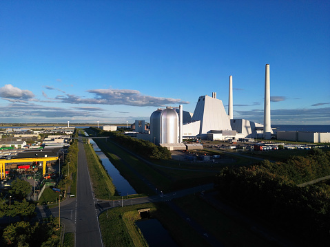 Aerial view of a power plant on a late sunny afternoon outside of Copenhagen, Denmark