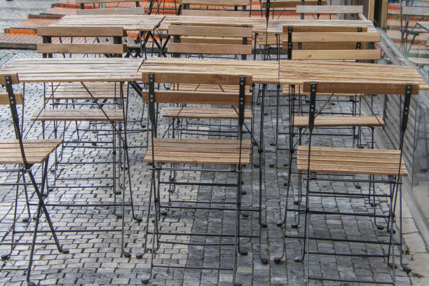 istock tables and chairs are wet after rain 1468295760