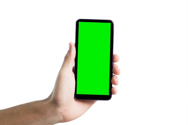 istock Hand holding smartphone with green screen. 1468300253