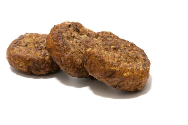 Frikadellen (squashed meatballs) isolated on a white background. Frikadellen (squashed meatballs) isolated on a white background. German food concept. spanish hamburger stock pictures, royalty-free photos & images