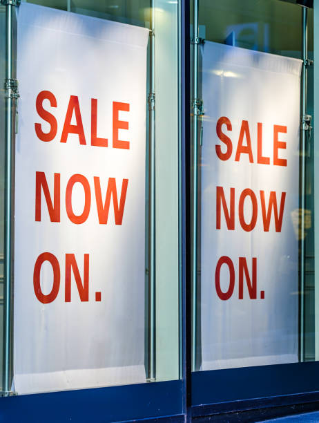 istock sale sign at a shop window 1468306726