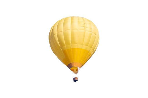 Yellow balloon with a basket for people isolated on a white background.