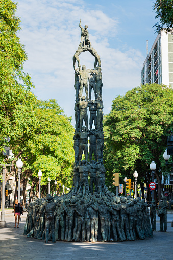 Statue of Castellers on the Rambla Nova street in Tarragona, one of the main pedestrian streets in the city.