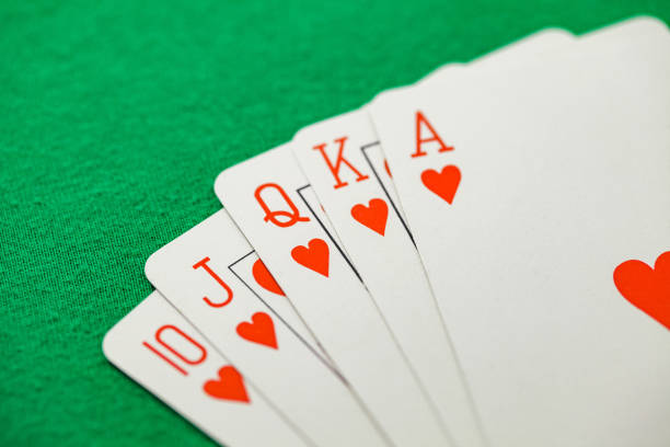 Playing cards, poker combination royal flush of hearts