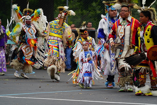 Wisconsin Dells, Wisconsin USA - September 17th, 2022: Male Native Americans of Ho-Chunk Nation performing Pow Wow in front of an audience.