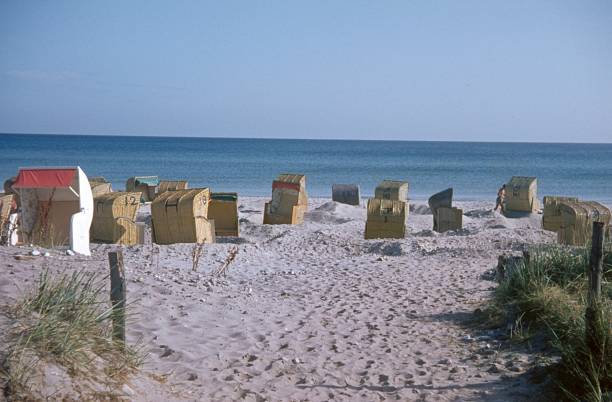 Germany, 1969. Beach with beach chairs on the North Sea coast.