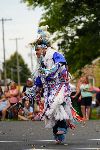 Wisconsin Dells, Wisconsin USA - September 17th, 2022: Male Native Americans of Ho-Chunk Nation performing Pow Wow in front of an audience.