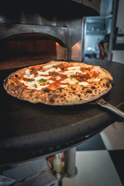 istock Pizzaiolo prepares Neapolitan pizza 1468326290