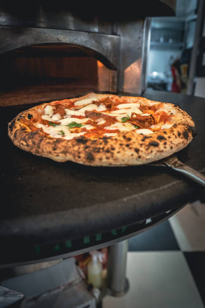 istock Pizzaiolo prepares Neapolitan pizza 1468326317