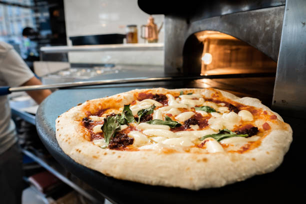 istock Pizzaiolo prepares Neapolitan pizza 1468326320