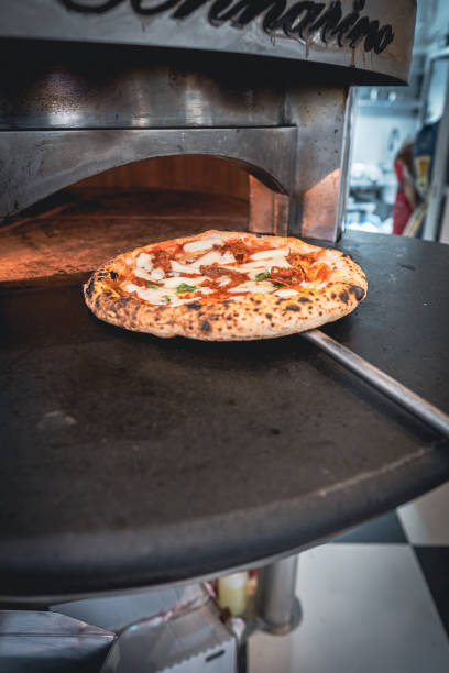 istock Pizzaiolo prepares Neapolitan pizza 1468326323