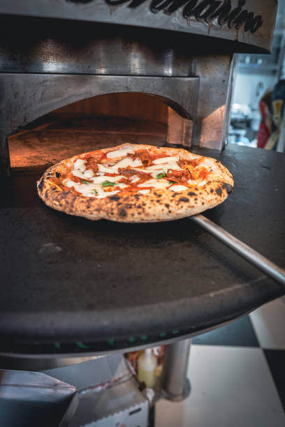 istock Pizzaiolo prepares Neapolitan pizza 1468326387
