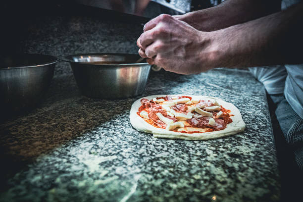 istock Pizzaiolo prepares Neapolitan pizza 1468326521