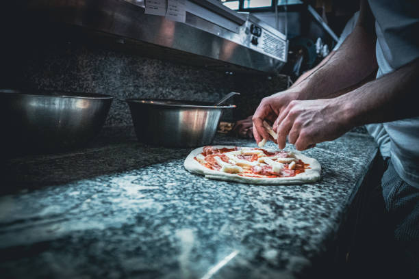 istock Pizzaiolo prepares Neapolitan pizza 1468326552