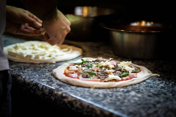 istock Pizzaiolo prepares Neapolitan pizza 1468326618