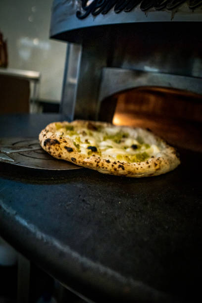 istock Pizzaiolo prepares Neapolitan pizza 1468326683