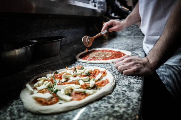 istock Pizzaiolo prepares Neapolitan pizza 1468327217